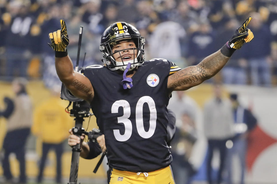 Pittsburgh Steelers running back James Conner (30) celebrates after scoring a touchdown against the Los Angeles Chargers in the first quarter of an NFL football game against the Pittsburgh Steelers, Sunday, Dec. 2, 2018, in Pittsburgh. (AP Photo/Gene J. Puskar)