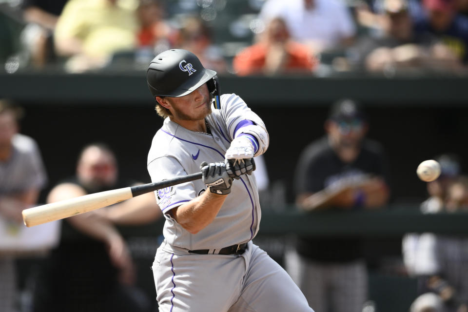 Colorado Rockies' Hunter Goodman bats during the fifth inning of a baseball game against the Baltimore Orioles, Sunday, Aug. 27, 2023, in Baltimore. (AP Photo/Nick Wass)