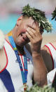 A tearful Matthew Pinsent of Great Britain stands on the podium during the medal ceremony for the men's four event on August 21, 2004 during the Athens 2004 Summer Olympic Games at the Schinias Olympic Rowing and Canoeing Centre in Athens, Greece. (Photo by Shaun Botterill/Getty Images)