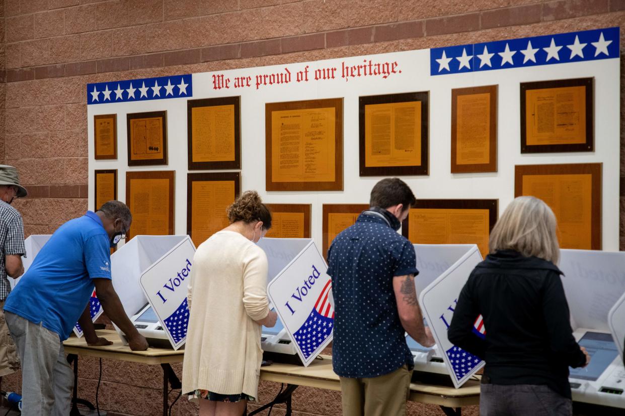 Voters cast their ballots