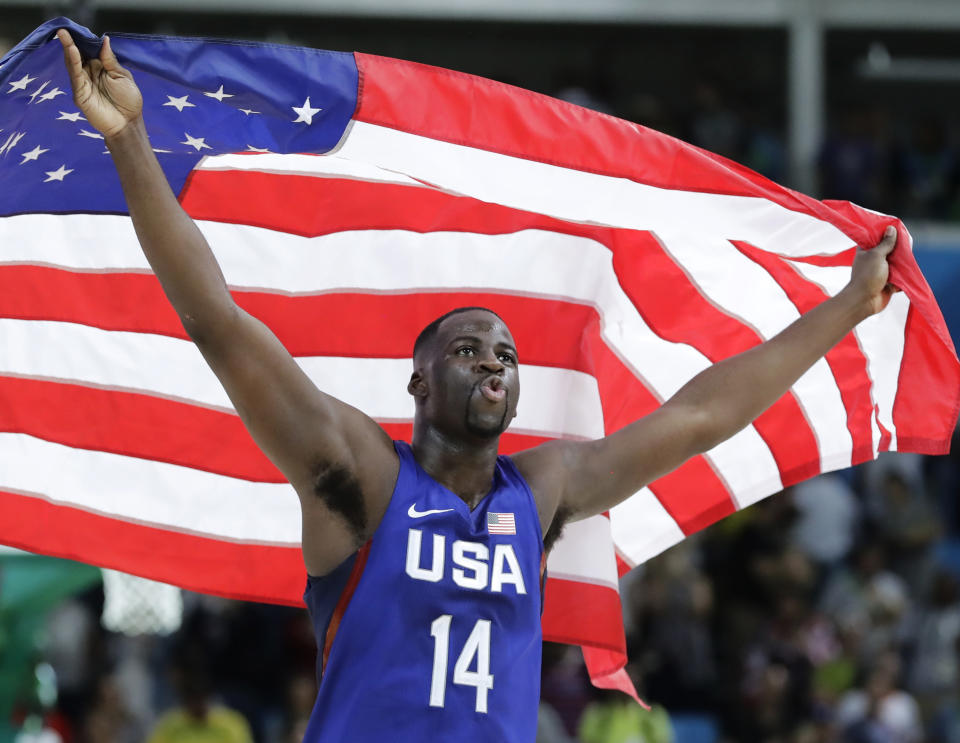 United States' Draymond Green (14) celebrates winning the men's basketball gold medal at the 2016 Summer Olympics in Rio de Janeiro, Brazil, Sunday, Aug. 21, 2016. (AP Photo/Matt York)