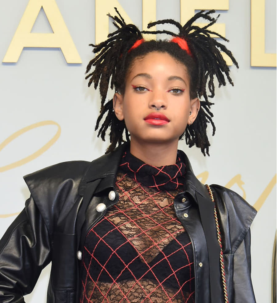 <p>Willow Smith swept her dreadlocks into four playful ponytails and swiped on bright red lipstick for the Chanel Metiers D’art Collection Paris Cosmopolite show in Tokyo, Japan. (Photo by Jun Sato/WireImage) </p>