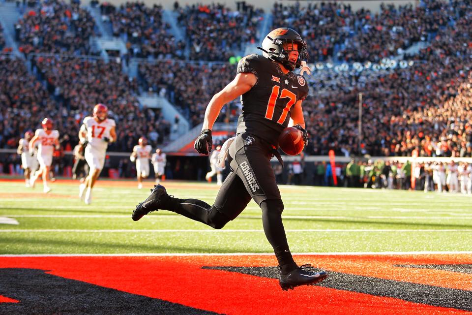Wide receiver John Paul Richardson of Oklahoma State scores on an 83-yard reception during a game against Iowa State on Nov. 12 at Boone Pickens Stadium in Stillwater. Richardson is now at TCU.