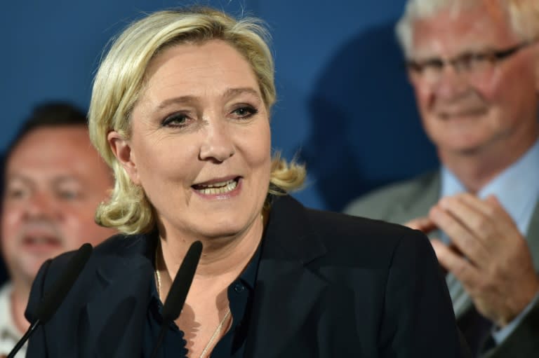 Far-right leader Marine Le Pen entered parliament for the first time in her career in one of eight seats won by the National Front