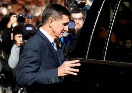 FILE PHOTO: Former U.S. National Security Adviser Michael Flynn departs after a plea hearing at U.S. District Court, in Washington, U.S., December 1, 2017.   REUTERS/Joshua Roberts/File Photo