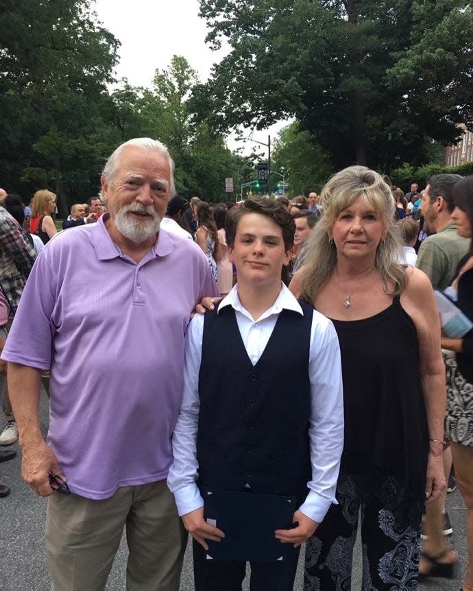 Ronnie with James and Judith Wittig, parents of Dr. James Wittig, his adoptive father.