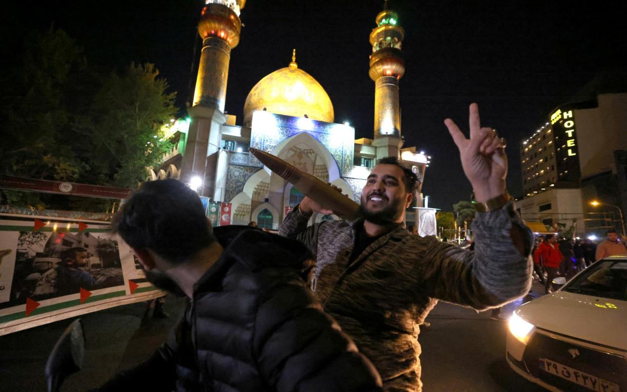 Iranians celebrate the missile attacks