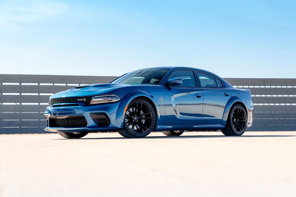 <p>If you need more practicality than a Challenger can offer, step up to a Charger. You can't have it with a stick, but you are getting one of the fastest sedans in the world, with a top speed of 196 mph. It's a lot cheaper than any European super-sedan, too. </p>