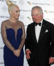 Prince Charles met Katy Perry, left, at a reception for supporters of the British Asian Trust in London, in February 2020. The singer and the royal have shared interests in the charity sector and she called him a "kind soul". (Kirsty Wigglesworth/AP)