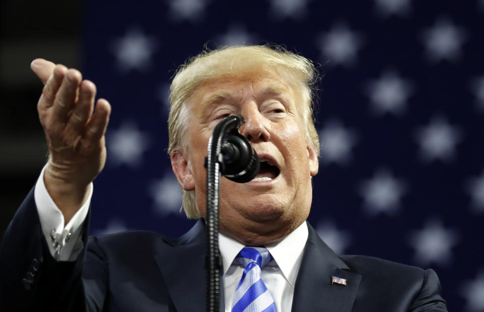 FILE - In this Aug. 21, 2018, file photo, President Donald Trump speaks during a rally in Charleston, W.Va. Trump denied the crimes of his ex-lawyer were criminal, complained about a politician plagiarizing his slogan despite his history of doing the same and defied data in declaring the U.S. is No. 1 in environmental quality. (AP Photo/Alex Brandon)