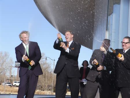 The late Aubrey McClendon (L) is pictured christening a boathouse with (L-R) Clay Bennett, Mayor Mick Cornett and Rand Elliott, in Oklahoma City in 2006. REUTERS/Oklahoma City Boathouse Foundation