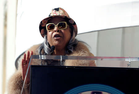 FILE PHOTO: Actress Della Reese speaks as actor Freddie Prinze, Jr. (not pictured) looks on during ceremonies honoring his late father, Freddie Prinze, as his father's star was unveiled on the Hollywood Walk of Fame in Hollywood, Los Angeles, California, U.S., December 14, 2004. REUTERS/Fred Prouser/File Photo