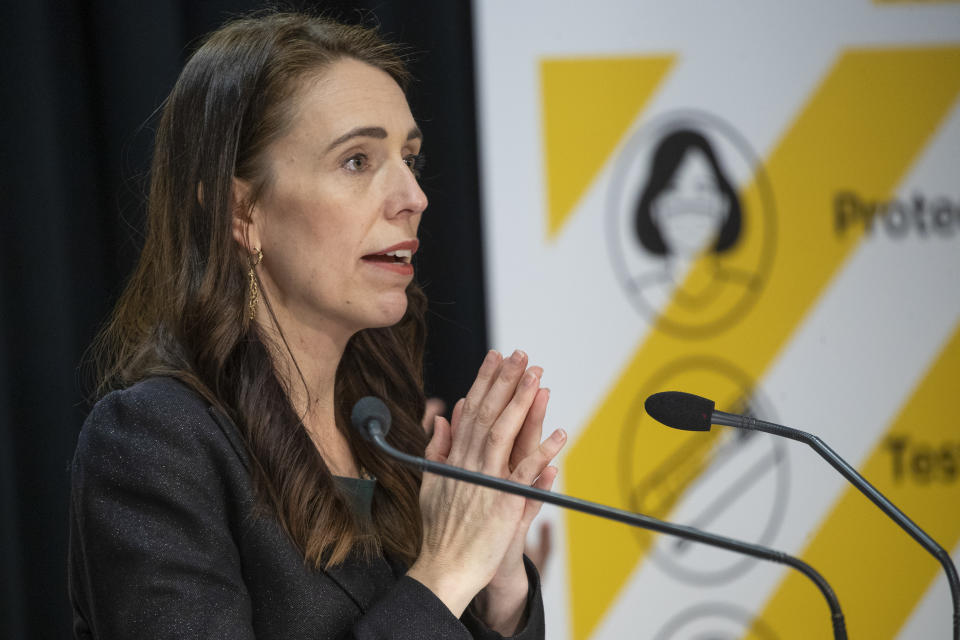 New Zealand Prime Minister Jacinda Ardern gestures during her COVID-19 response and vaccine update in Wellington, New Zealand, Thursday, Aug. 26, 2021. By early next week, New Zealanders should know if their government's strict new lockdown is working to stamp out its first coronavirus outbreak in six months. A successful effort could again make the nation's virus response the envy of the world. (Mark Mitchell/Pool Photo via AP)