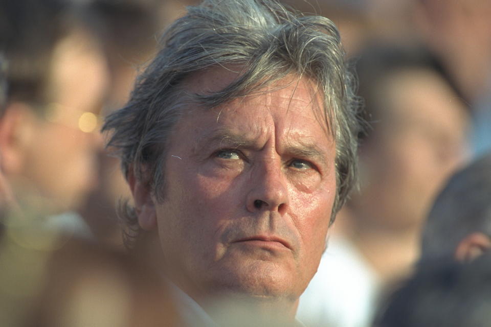 <p>(Original Caption) Alain Delon among the spectators. (Photo by Bernard Bisson/Sygma via Getty Images)</p>
