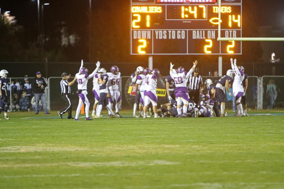 Lemoore celebrates after scoring a touchdown against Central Valley Christian in the Central Section Division II high school championship game on Friday, November 25, 2022.