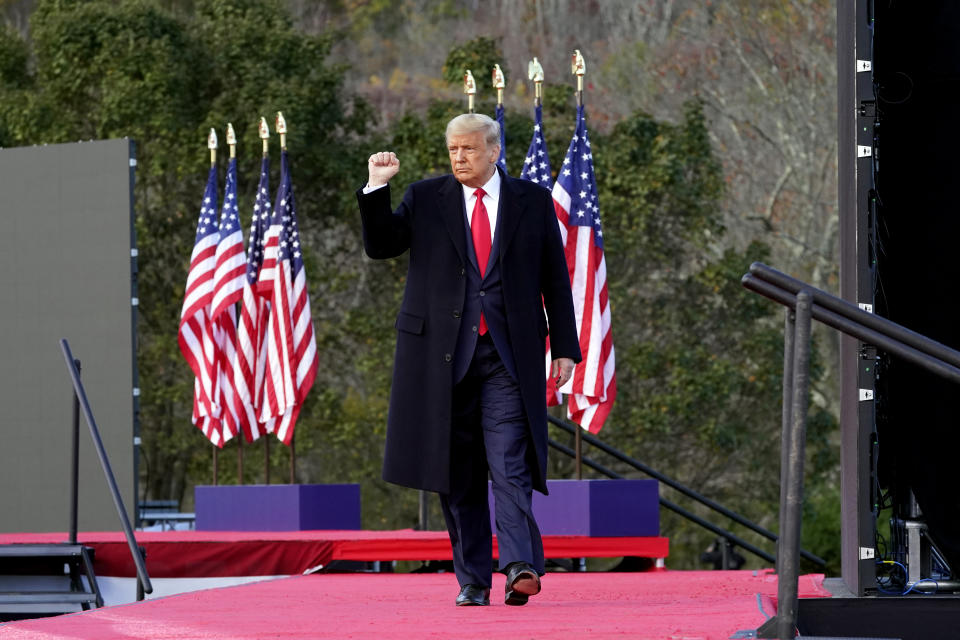 President Donald Trump leaves after speaking at a campaign rally at Keith House, Washington's Headquarters, Saturday, Oct. 31, 2020, in Newtown, Pa. (AP Photo/Alex Brandon)