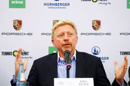 Three-times Wimbledon champion Boris Becker gestures as he is announced as German Tennis Federation's (DTB) new head of men's tennis during a news conference in Frankfurt, Germany, August 23, 2017. REUTERS/Kai Pfaffenbach