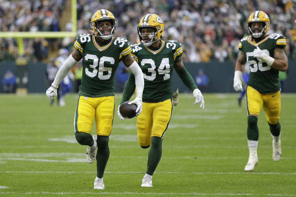 Green Bay Packers safety Anthony Johnson Jr. (36) celebrates after intercepting a pass during the second half of an NFL football game against the Los Angeles Rams, Sunday, Nov. 5, 2023, in Green Bay, Wis. (AP Photo/Matt Ludtke)