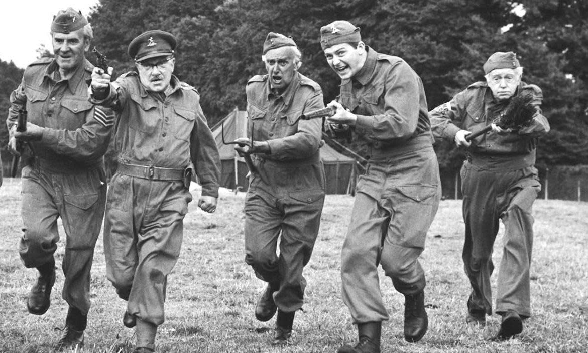 <span>Ready for a fall – or a drenching … Ian Lavender, second from right, in Dad’s Army.</span><span>Photograph: PA</span>