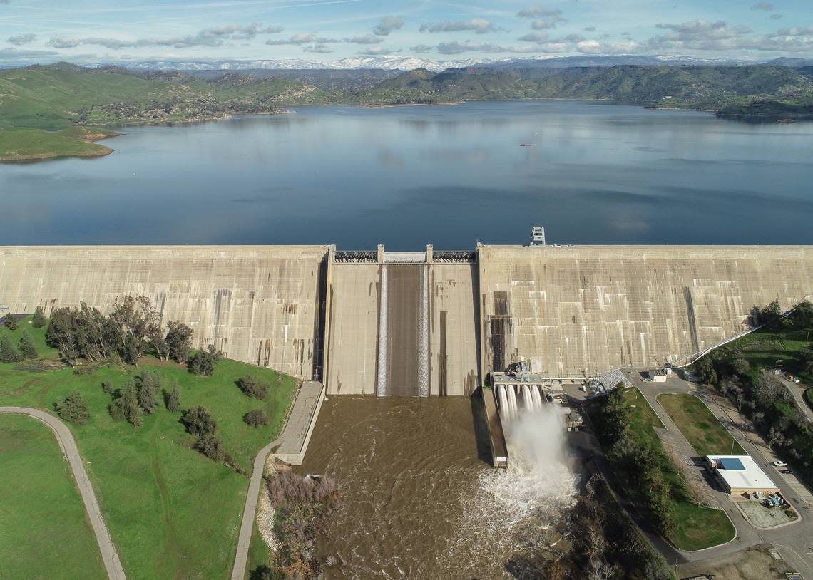 Water releases can be seen from Friant Dam at Millerton Lake in Friant where lake levels have reached more than 80 percent-full following several atmospheric river events, on Wednesday, Jan. 18, 2023. Last year at this time the lake was at 56 percent of capacity.