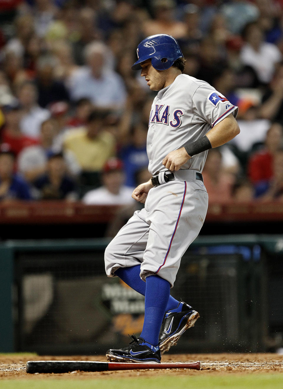 HOUSTON - MAY 18: Ian Kinsler #5 of the Texas Rangers scores on a sacrifice fly by Adrian Beltre #29 of the Texas Rangers against the Houston Astros at Minute Maid Park on May 18, 2012 in Houston, Texas. (Photo by Bob Levey/Getty Images)