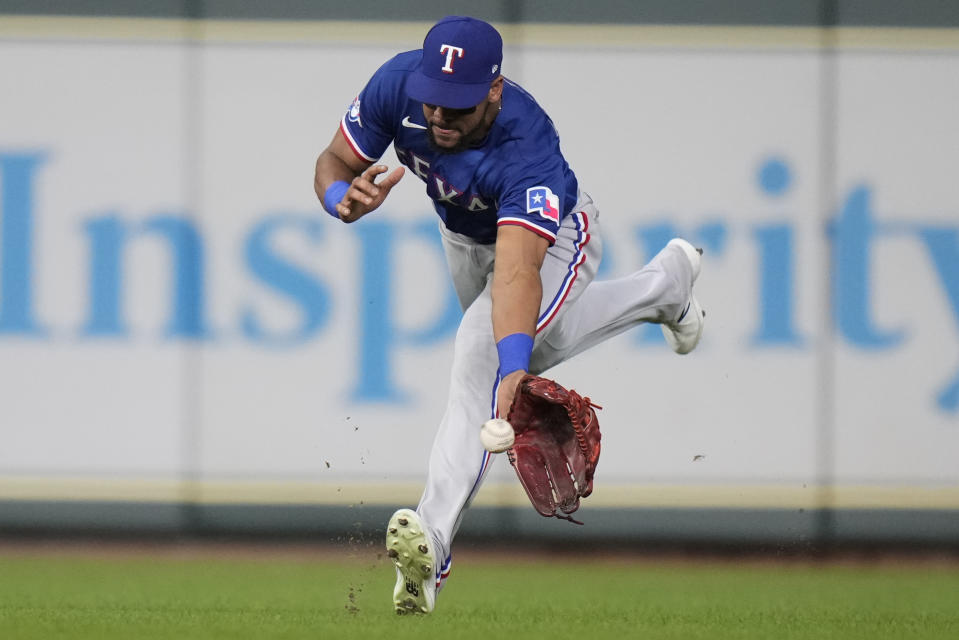 Texas Rangers center fielder Leody Taveras fields a line-drive single by Houston Astros' Alex Bregman during the fifth inning of a baseball game Tuesday, Sept. 6, 2022, in Houston. (AP Photo/Eric Christian Smith)