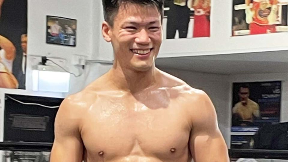 Takeshi Inoue (pictured) poses during boxing training.