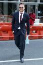 James McAvoy is all smiles as he walks through N.Y.C. on Wednesday, dressed in a suit and tie.