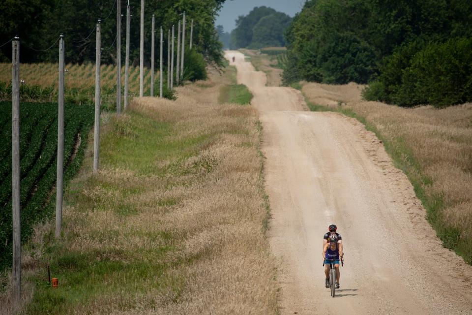 Cyclists ride the first optional gravel day of RAGBRAI in 2021.