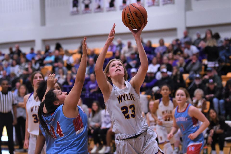 Wylie's Kaylan Adams (23) goes up for a shot during Friday's District 4-5A opener against Lubbock Monterey. Adams scored 11 points in the Lady Bulldogs' 58-40 loss.