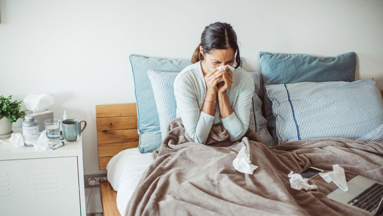  Woman poorly in bed. 