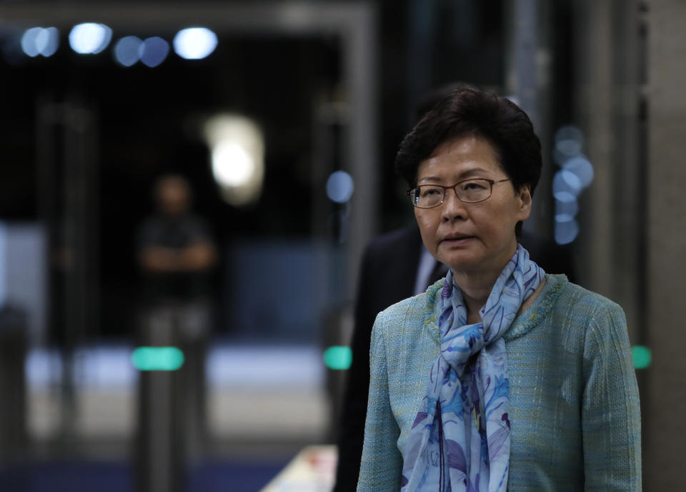 Hong Kong Chief Executive Carrie Lam listens to reporters questions during a press conference in Hong Kong, Tuesday, July 2, 2019, after hundreds of protesters in Hong Kong swarmed into the legislature's main building Monday night on the anniversary of Hong Kong's return to China. Lam condemned protesters who broke into the city's legislature and vandalized the building. (AP Photo/Vincent Yu)