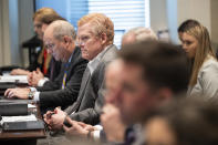 Alex Murdaugh, center, listens to Britt Dove, SLED agent specialist in computer forensics, speak about information from his cell phone during his trial for murder at the Colleton County Courthouse in Walterboro, S.C., on Wednesday, Feb. 1, 2023. (Joshua Boucher/The State via AP, Pool)