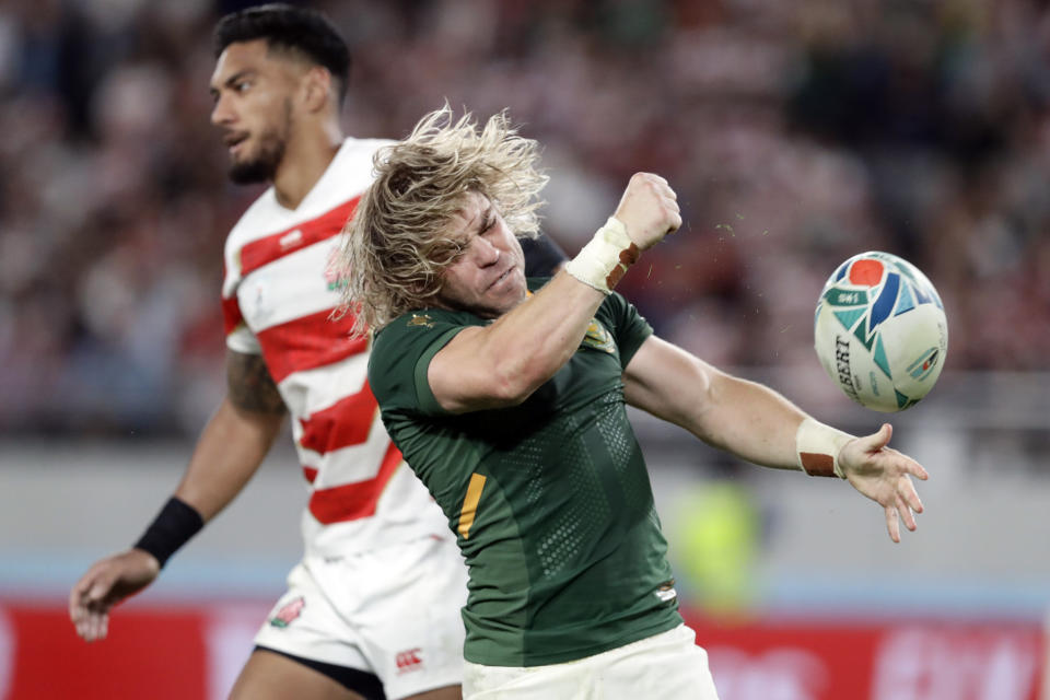South Africa's Faf de Klerk celebrates after scoring a try during the Rugby World Cup quarterfinal match at Tokyo Stadium between Japan and South Africa in Tokyo, Japan, Sunday, Oct. 20, 2019. (AP Photo/Mark Baker)