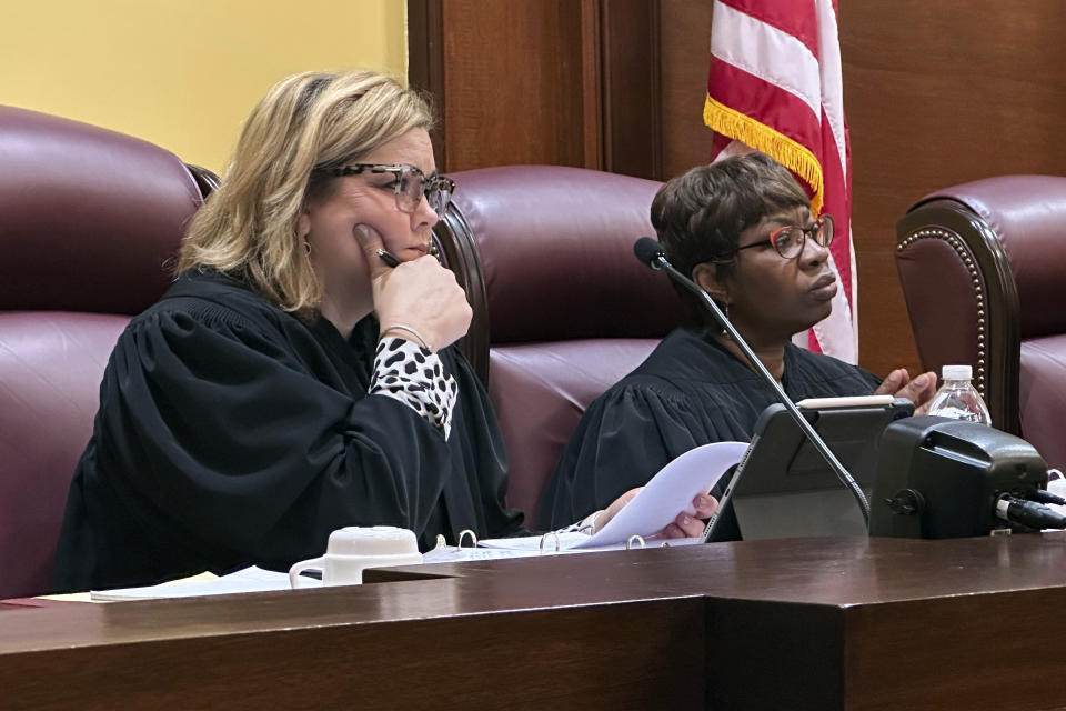 Missouri Supreme Court judges Kelly Broniec, left, and Robin Ransom listen to arguments in a case challenging the state's Senate districts, Thursday, Feb. 1, 2024, in Jefferson City, Mo.(AP Photo/David A. Lieb)