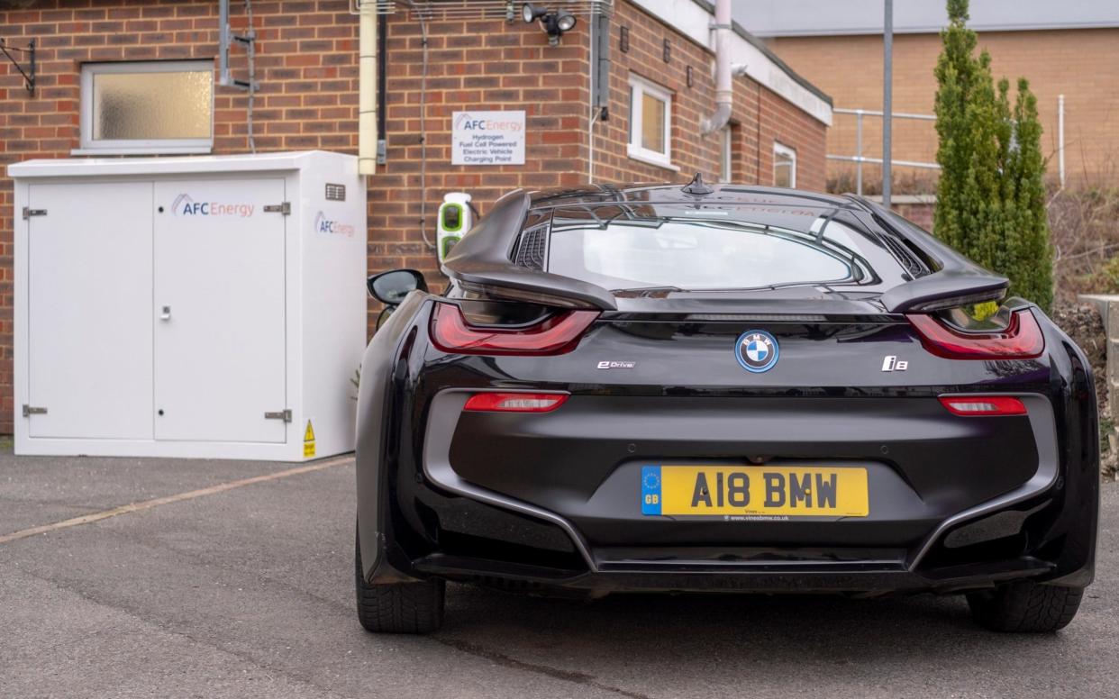 The BMW i8 plugged in to the first ever hydrogen fuel cell EV charging station  - Andrew Crowley