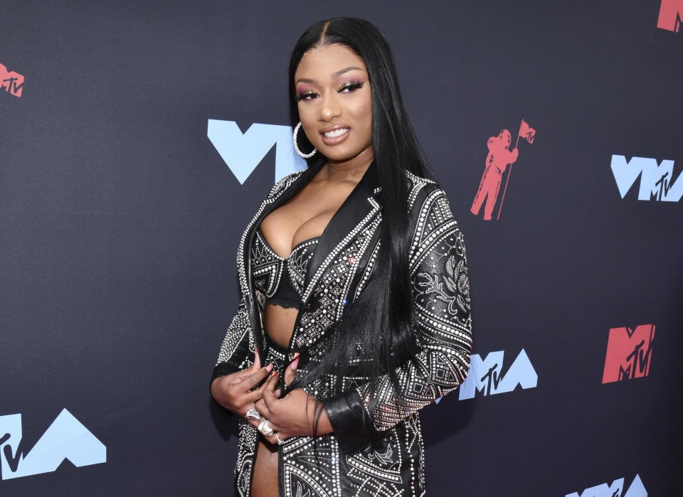 FILE - In this Aug. 26, 2019 file photo, Megan Thee Stallion arrives at the MTV Video Music Awards in Newark, N.J.. The rapper says she was shot multiple times, but expects to fully recover. The 25-year-old said in an Instagram post Wednesday that she had gunshot wounds from a crime committed against her Sunday with the intent to harm her and feels lucky to be alive. She did not say who shot her or why, and Los Angeles police had no immediate comment. (Photo by Charles Sykes/Invision/AP, File)