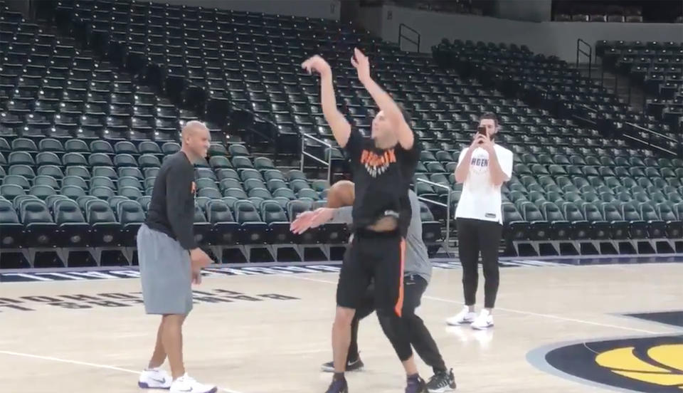 Maybe you just see a pair of hands. But Devin Booker sees a coach willing to use those hands to support him. (Screencap via Scott Bordow of the Arizona Republic)