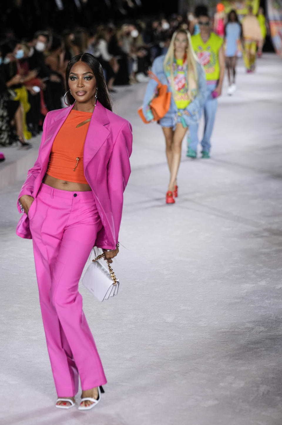 Naomi Campbell wears a creation for the Versace Spring Summer 2022 collection during Milan Fashion Week, in Milan, Italy, Friday, Sept. 24, 2021. (AP Photo/Luca Bruno)