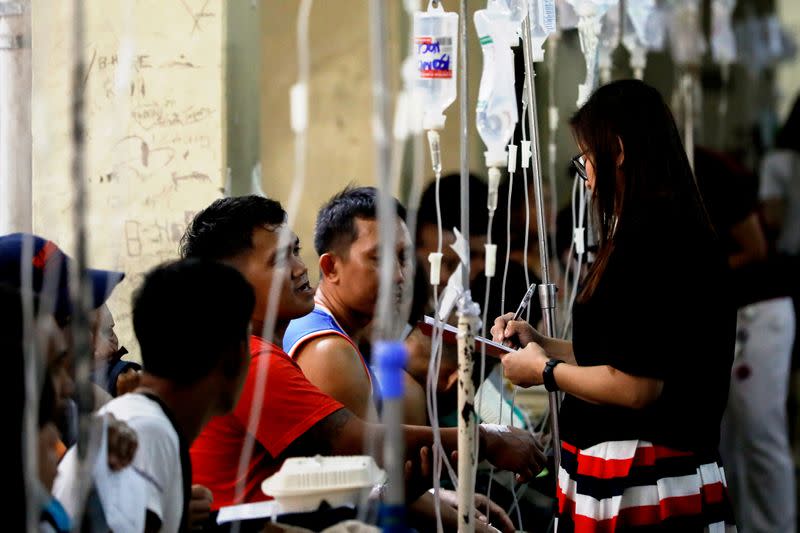 Patients poisoned after drinking coconut wine are treated at an emergency ward in Philippine General Hospital in Manila