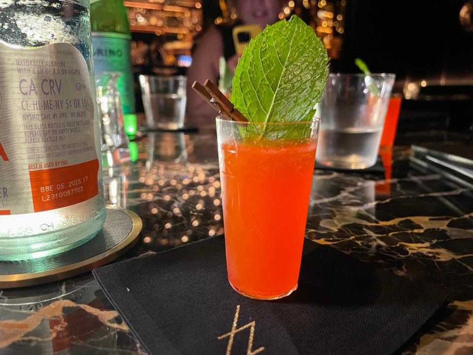 A complimentary strawberry, elderflower and ginger beer aperitif served before cocktails at The Vault.