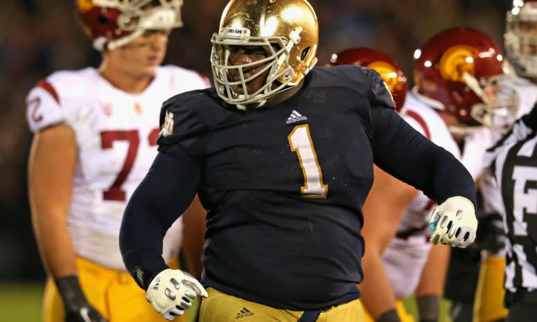 Louis Nix celebrates a play.