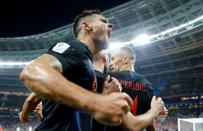 Soccer Football - World Cup - Semi Final - Croatia v England - Luzhniki Stadium, Moscow, Russia - July 11, 2018 Croatia's Ivan Perisic celebrates scoring their first goal with Dejan Lovren REUTERS/Darren Staples