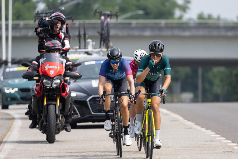 Two riders, Andrea Buttine and Holly Breck, were able to bridge the gap and joined Majorie at the point-y end of the bike race.