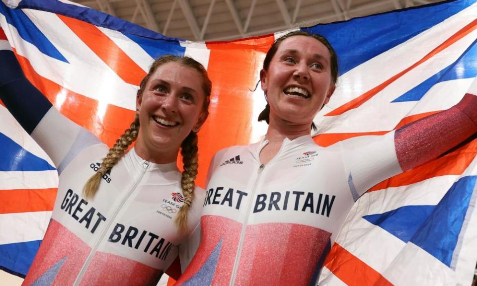 Laura Kenny and Katie Archibald celebrate winning gold.