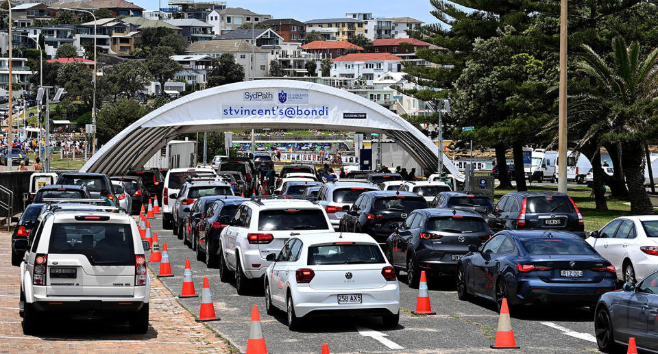 Cars lined up at a drive through Covid testing clinic in Bondi, NSW.