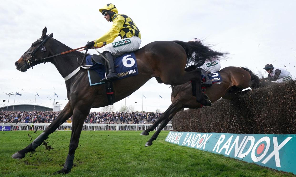 <span>Shishkin, ridden by Nico de Boinville, clears a fence in the William Hill Bowl Chase at Aintree in April.</span><span>Photograph: Bradley Collyer/PA</span>