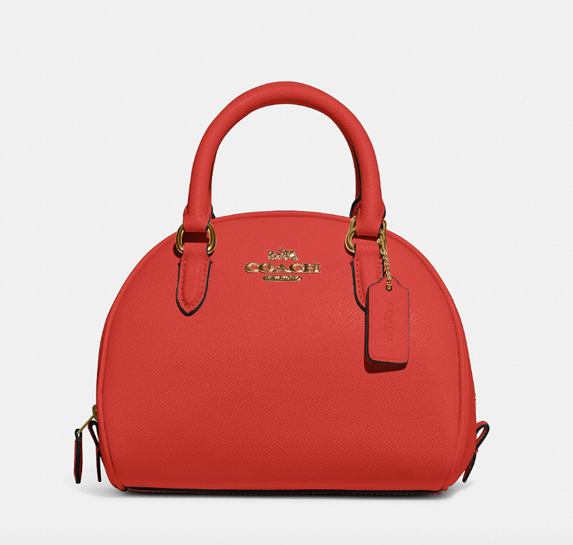 Sydney Satchel in IM/Miami Red (Photo via Coach Outlet)