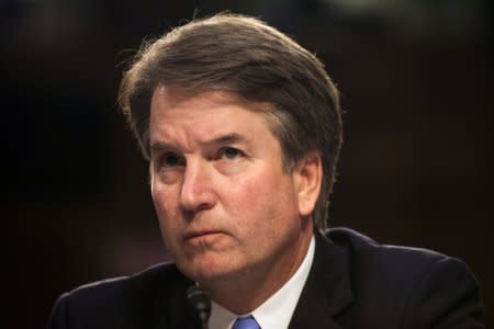 FILE PHOTO: Supreme Court nominee Brett Kavanaugh testifies during the third day of his confirmation hearing before the Senate Judiciary Committee on Capitol Hill in Washington, U.S., September 6, 2018. REUTERS/Alex Wroblewski