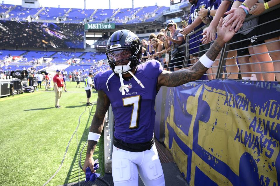 Baltimore Ravens wide receiver Rashod Bateman takes to the field for warmups prior to a game.
